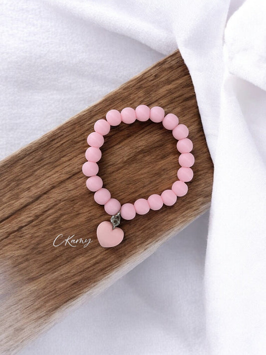 Bracelet enfant accroche coeur rose clair