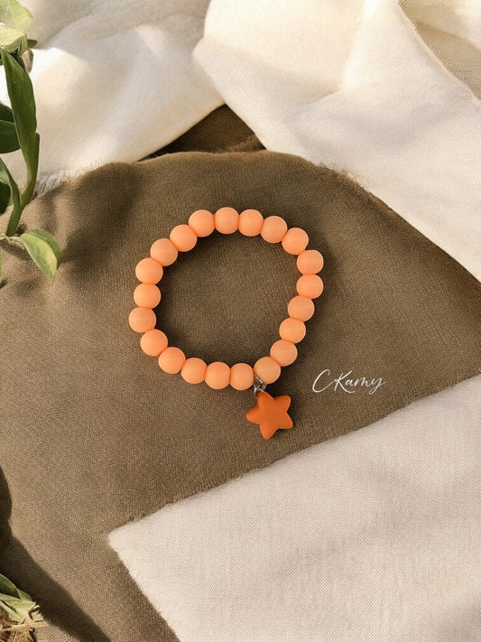 Bracelet enfant accroche étoile orange