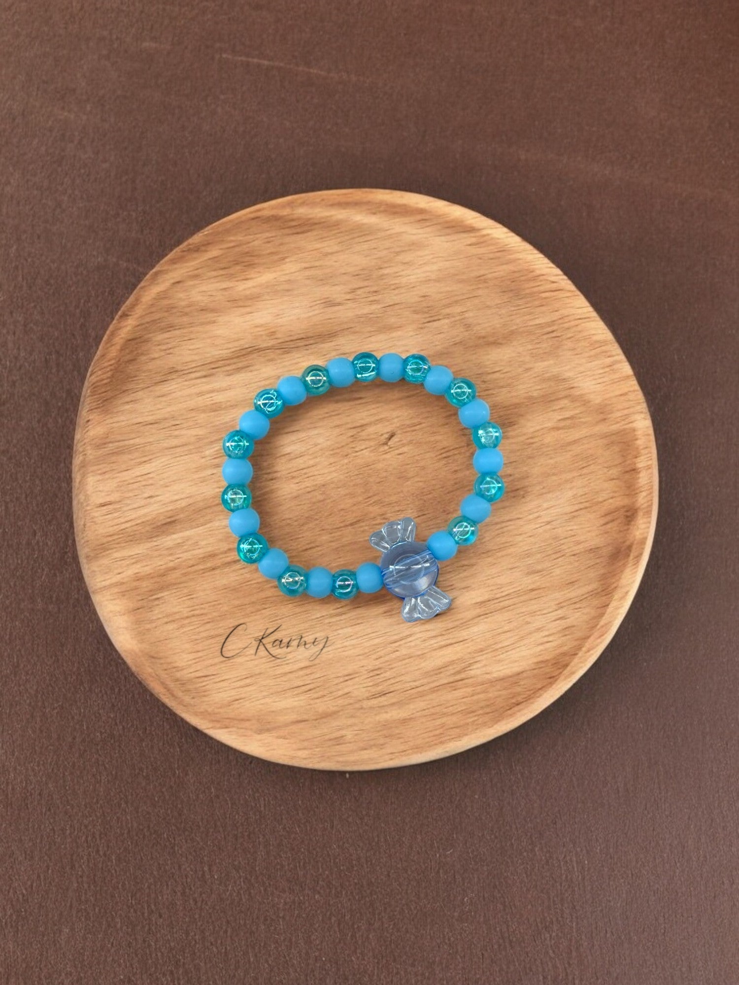 Bracelet enfant bonbon alterné bleu transparent