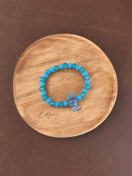 Bracelet enfant bonbon alterné bleu transparent
