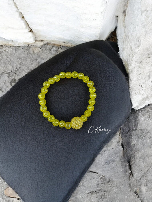 Bracelet enfant boule brillante jaune