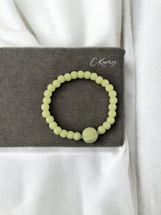 Bracelet enfant citrouille perles jaune clair