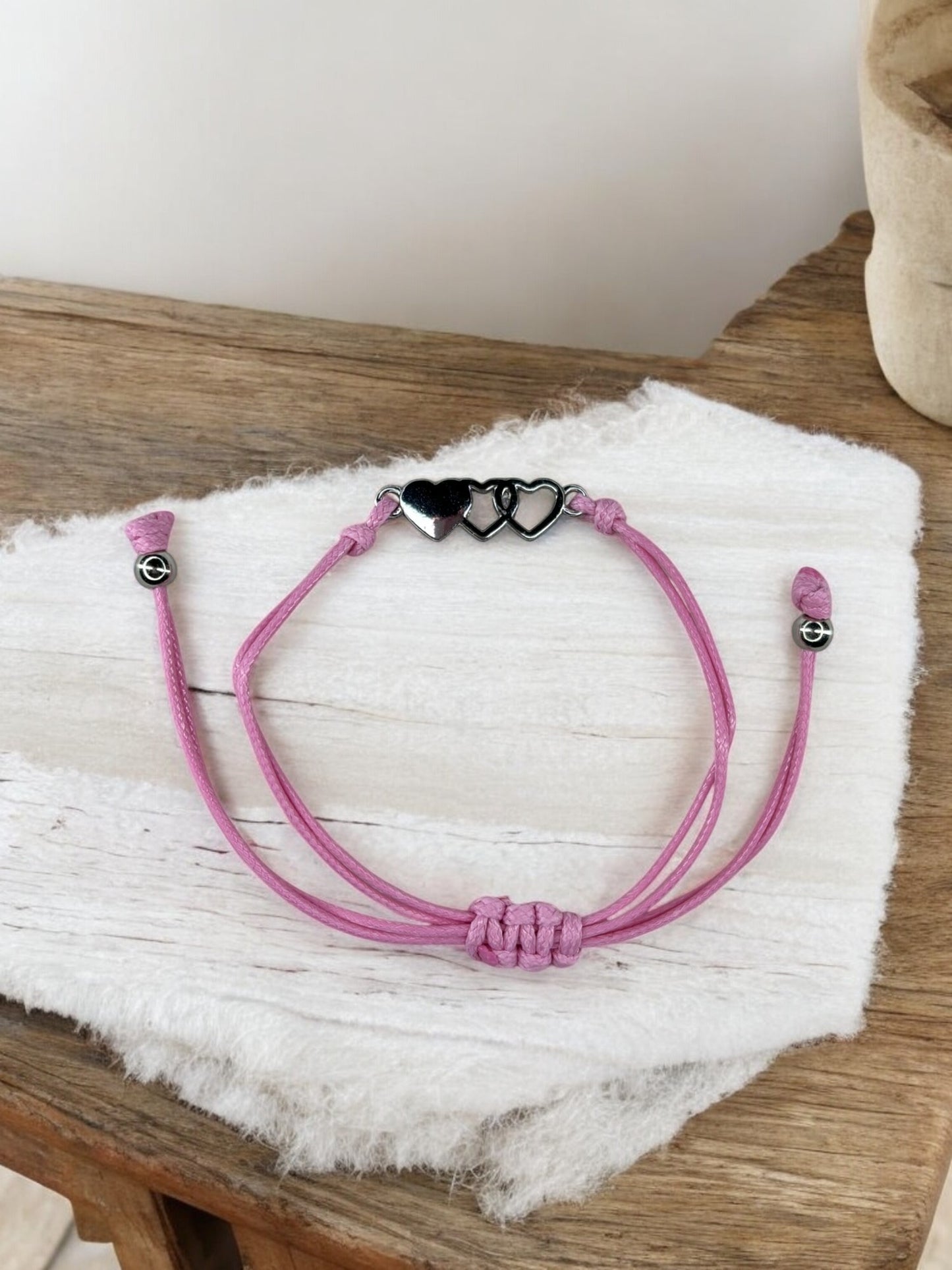 Bracelet enfant cordon 3 coeur rose