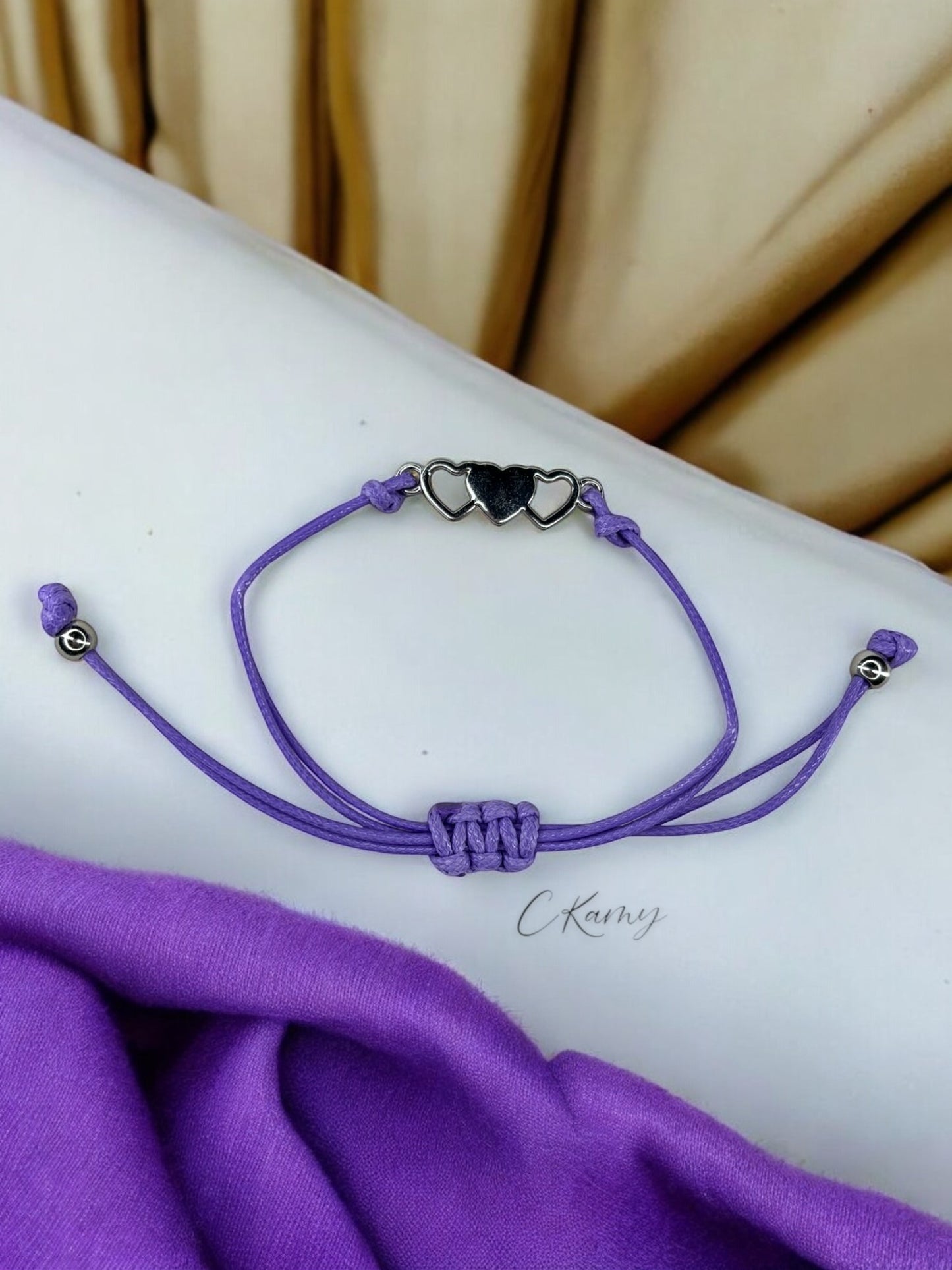 Bracelet enfant cordon 3 coeur violet