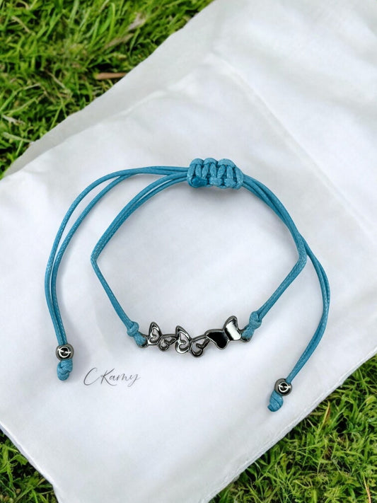 Bracelet enfant cordon 3 papillons bleu