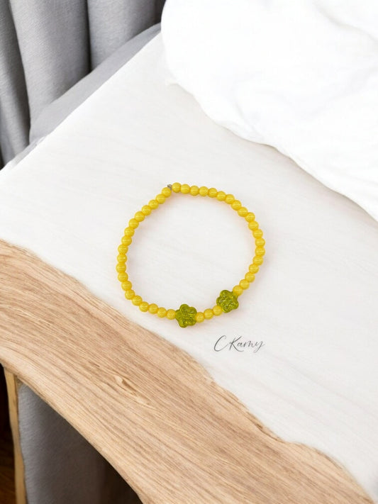 Bracelet enfant deux fleurs jaune