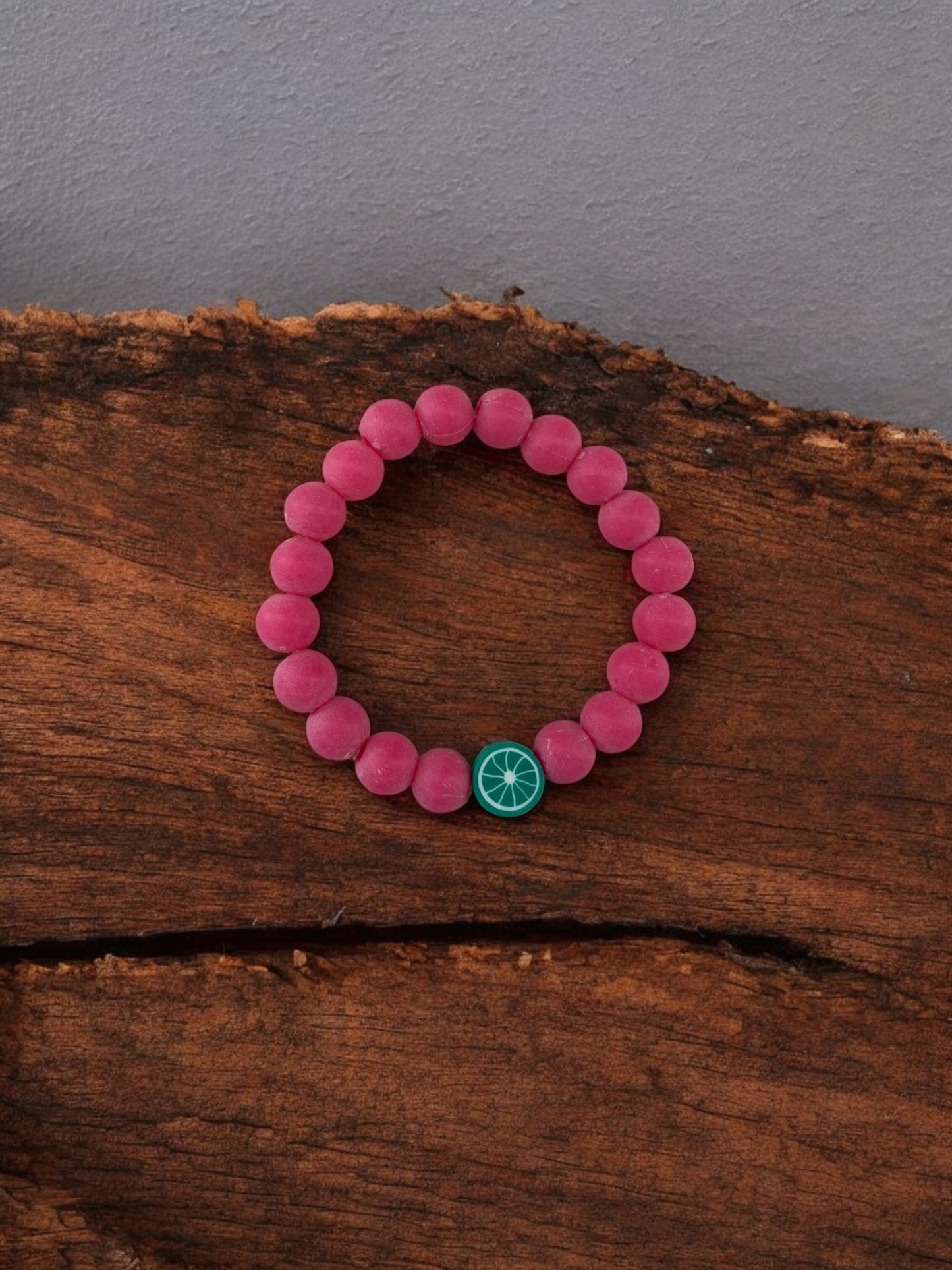Bracelet enfant perles rose foncé citron vert