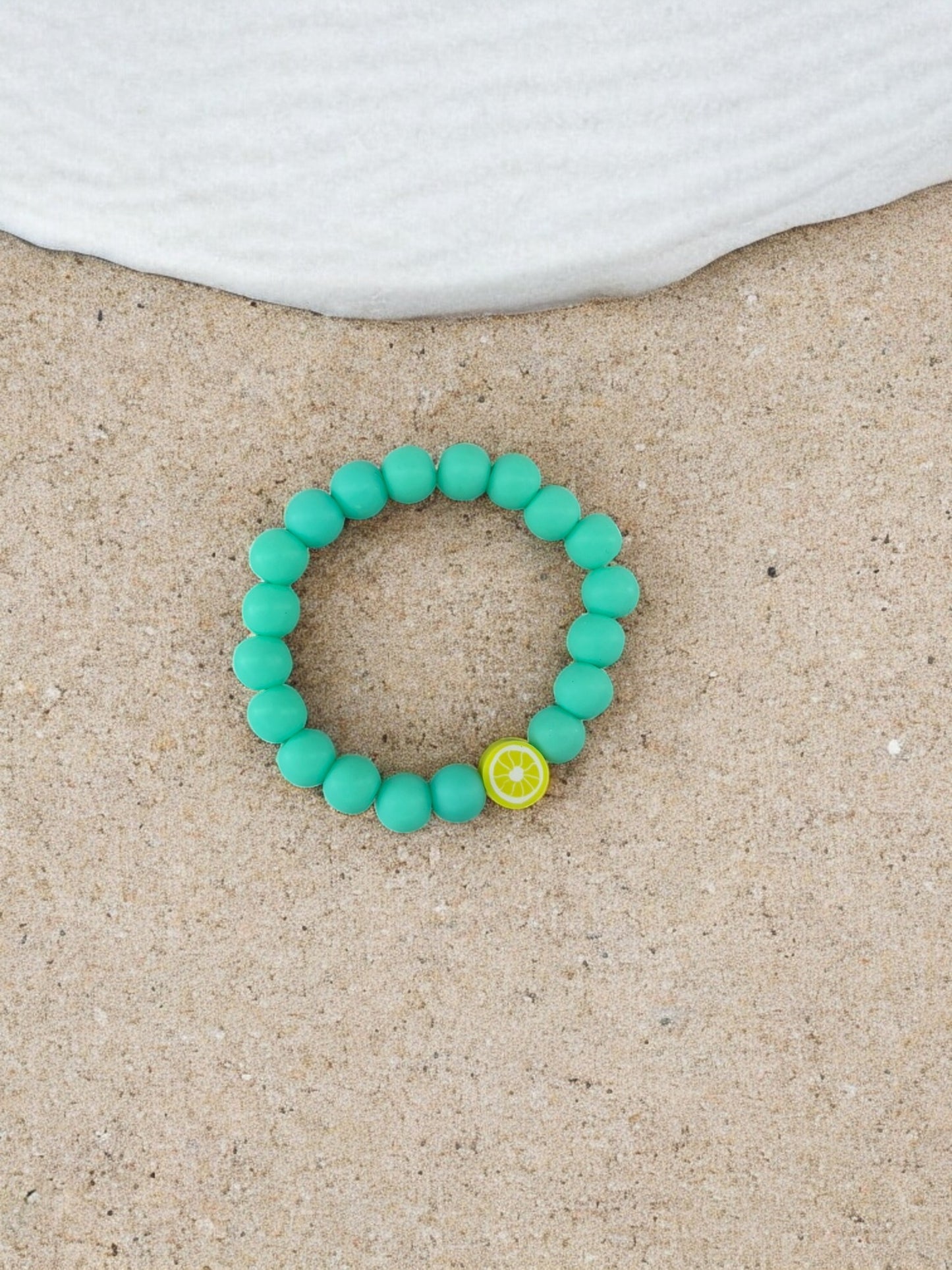 Bracelet enfant perles vert foncé citron