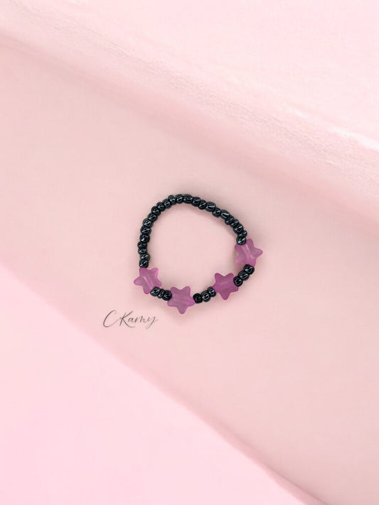 Bracelet enfant petites étoiles rose foncé noir brillant