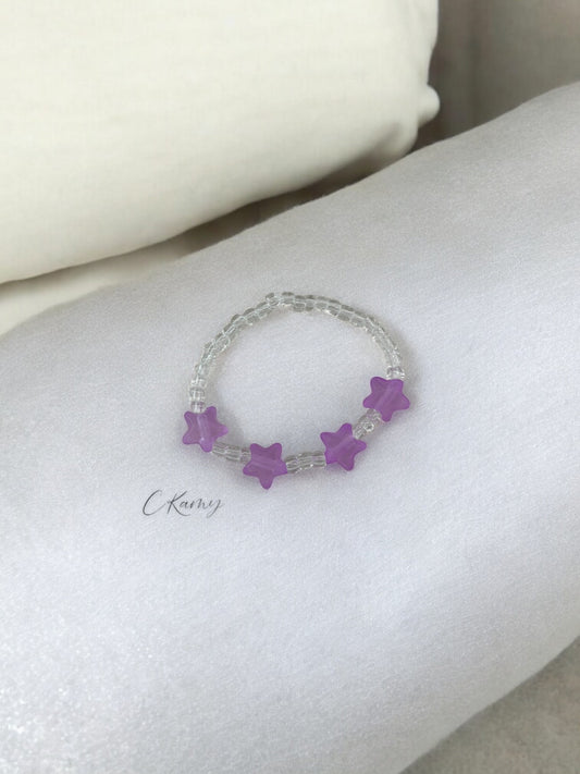 Bracelet enfant petites étoiles violet transparent