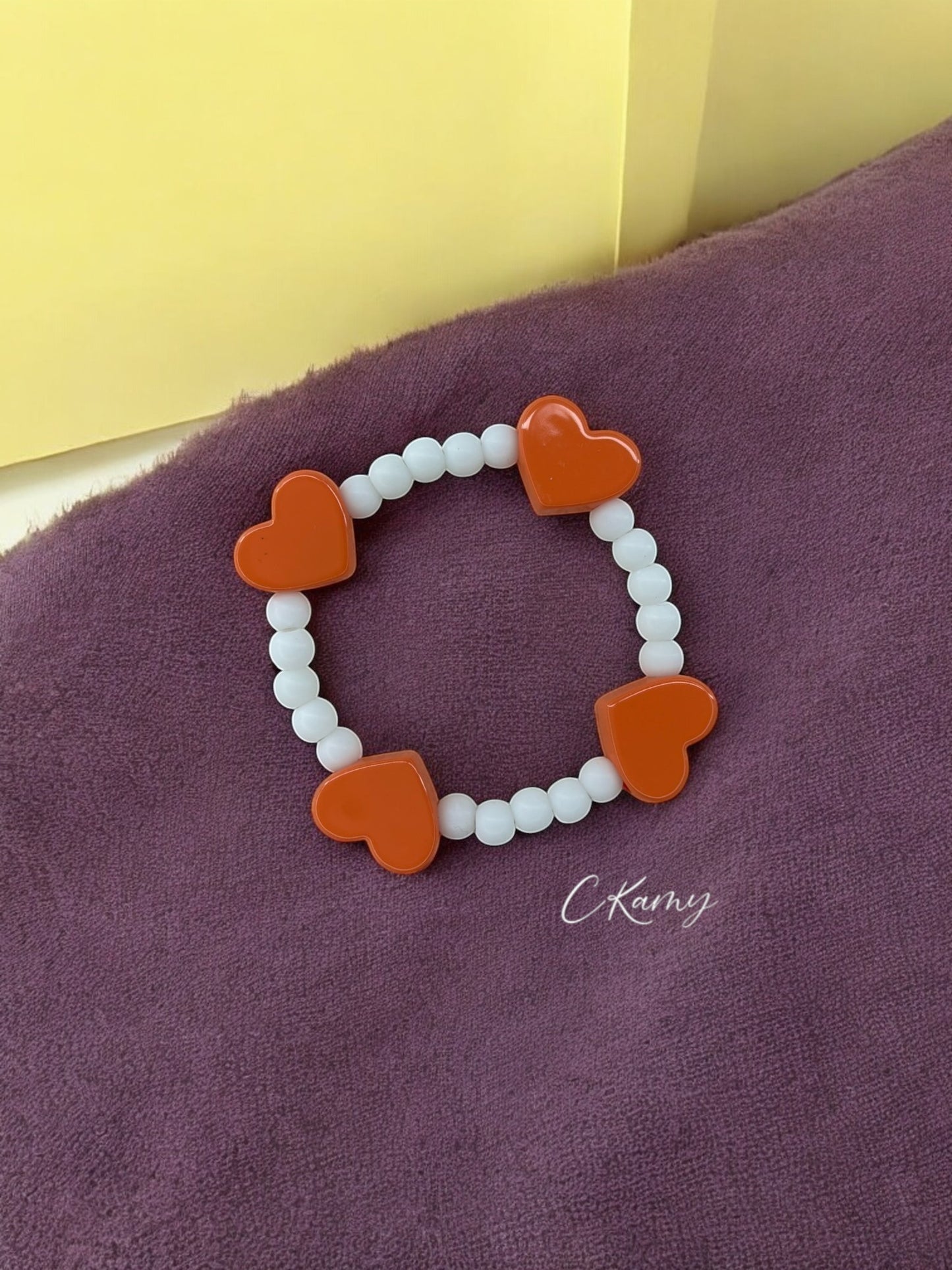 Bracelet enfant tour en coeur orange