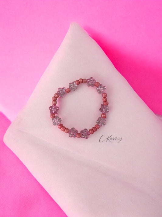 Bracelet enfant tour fleurs rose saumon