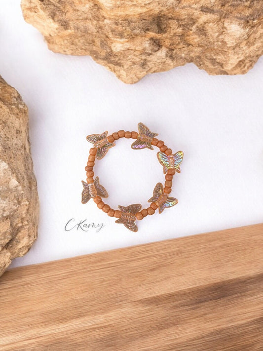Bracelet enfant tour papillon chair