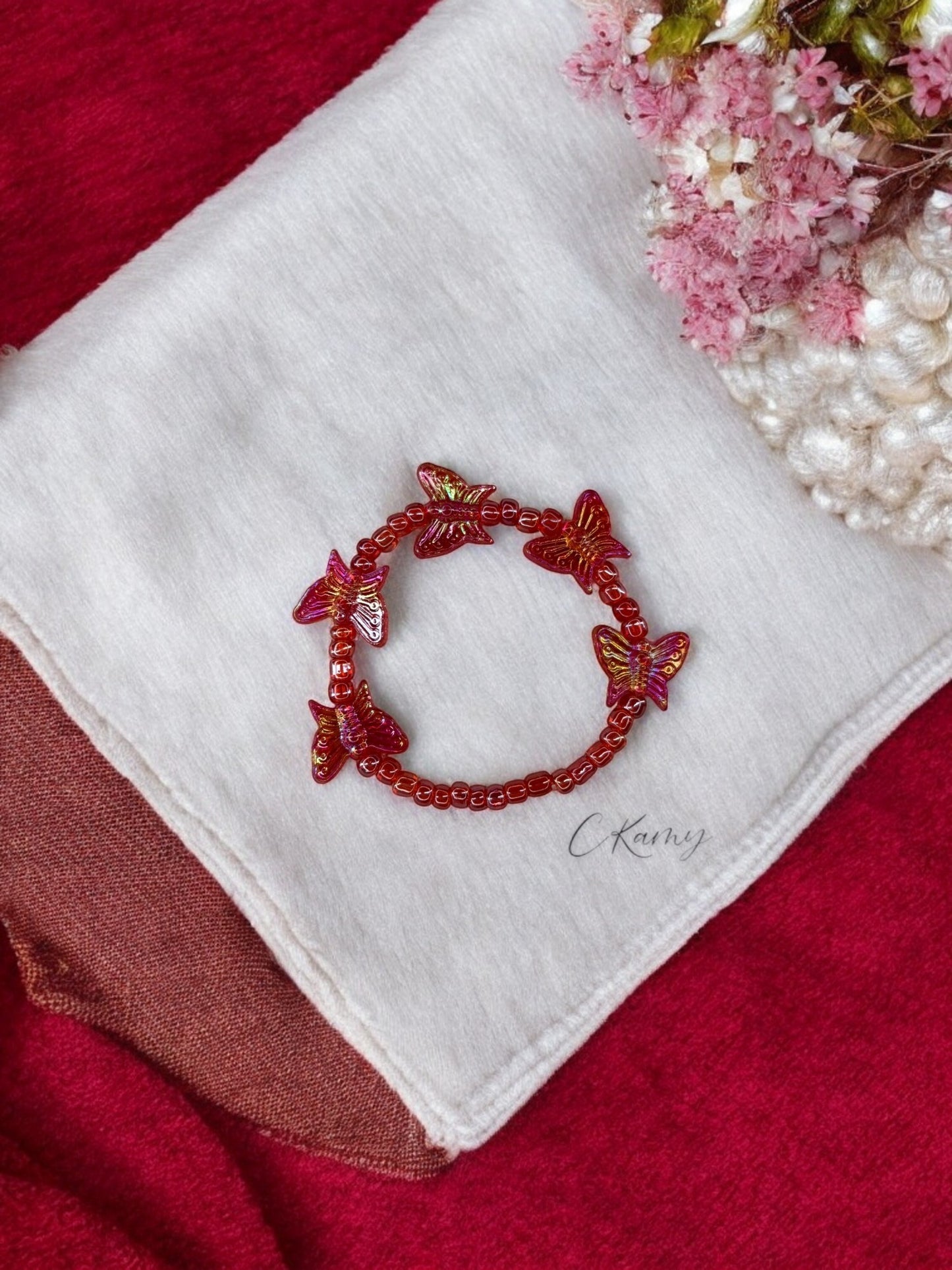 Bracelet enfant tour papillon rouge