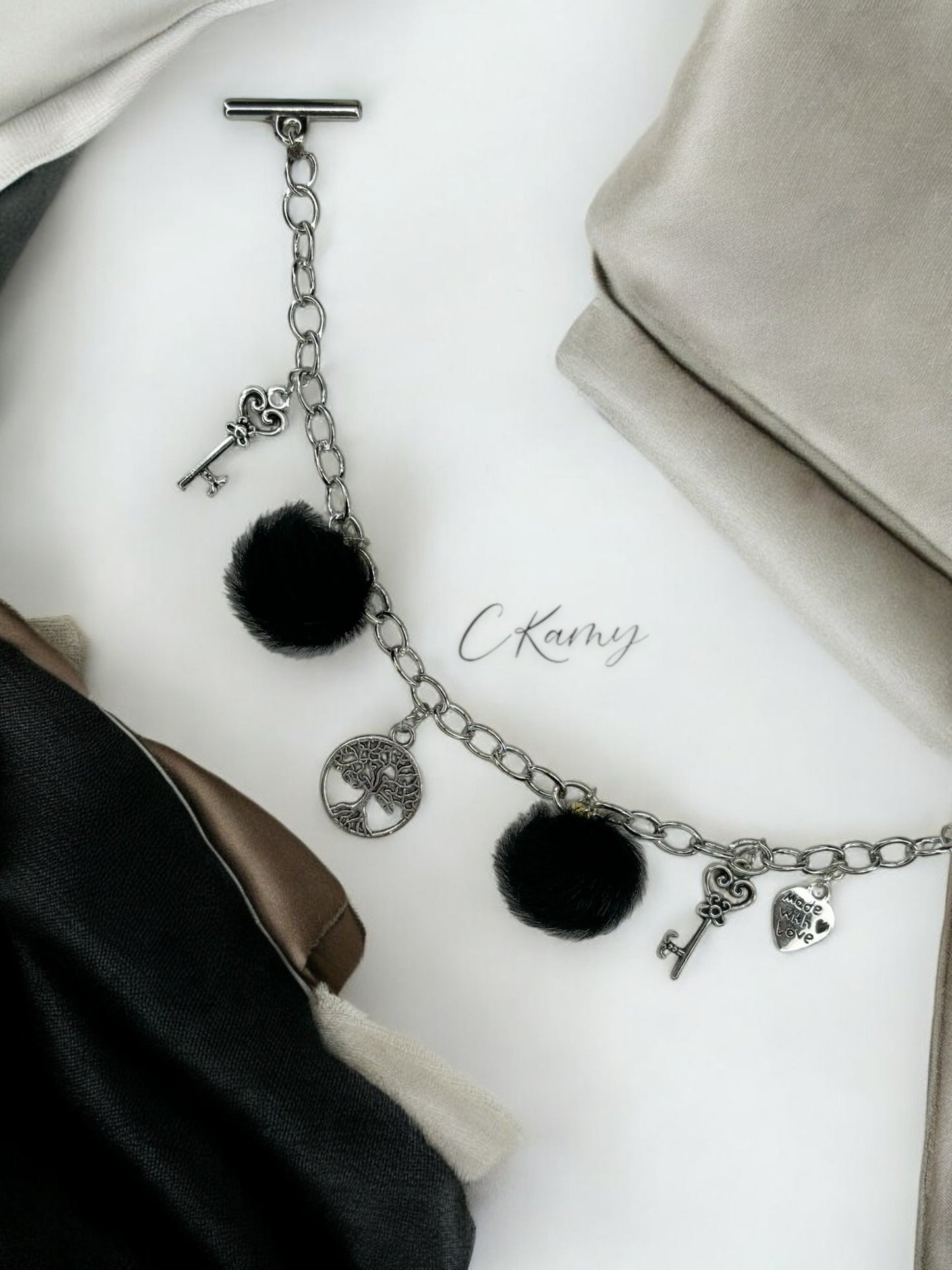 Bracelet femme chaîne moumoute noir