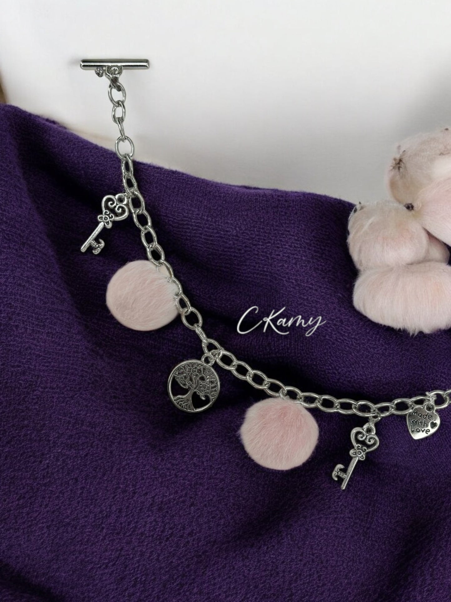 Bracelet femme chaîne moumoute rose clair