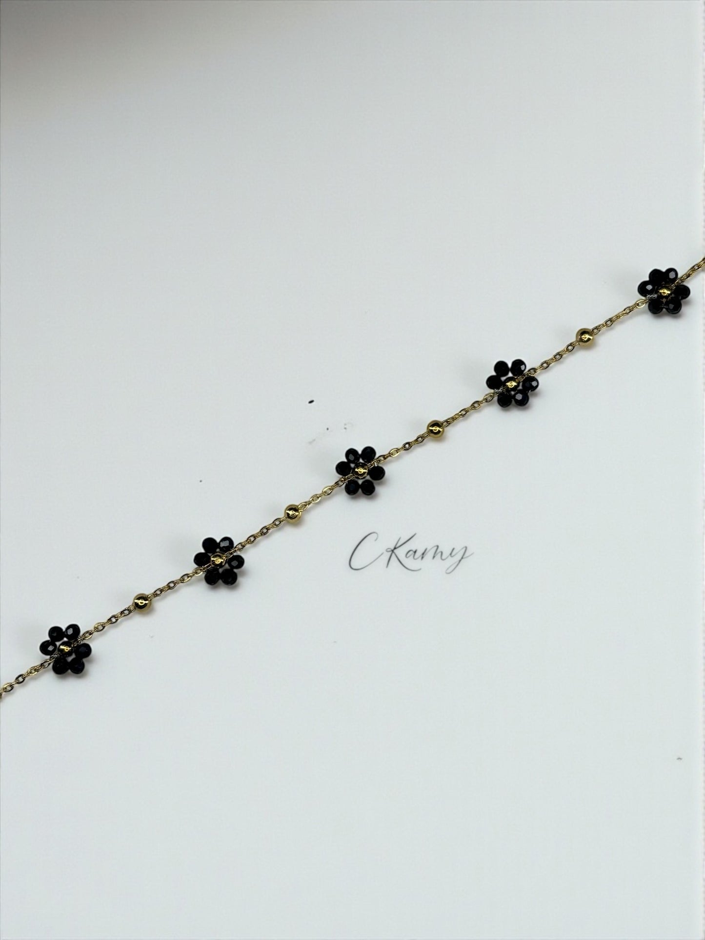 Bracelet femme chaînette doré fleurs noir
