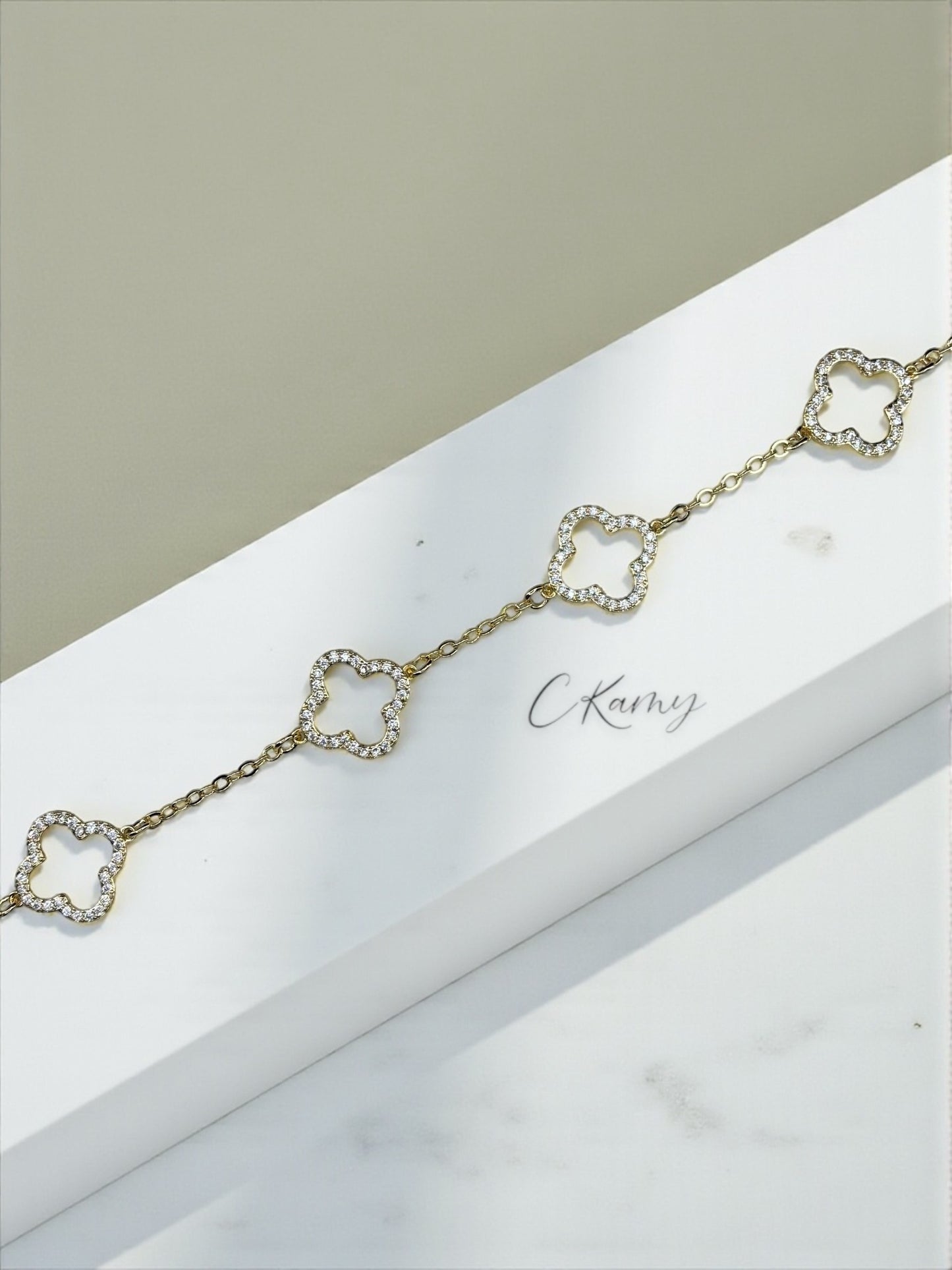 Bracelet femme chaînette doré trèfles doré strass