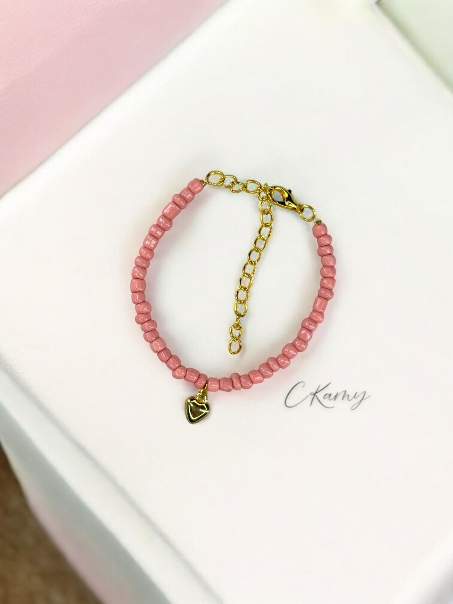 Bracelet femme coeur bombé rocaille rose saumon clair