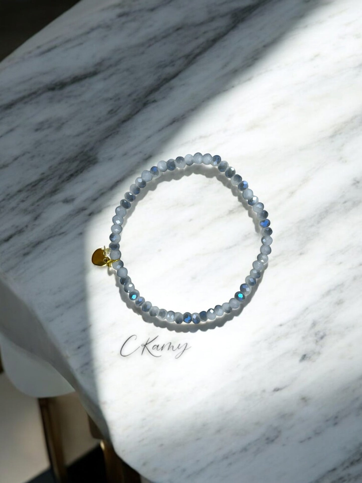 Bracelet femme coeur doré facettes 4mm gris dégradé