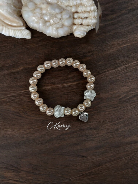 Bracelet femme coquillage nacré coeur chair clair brillant