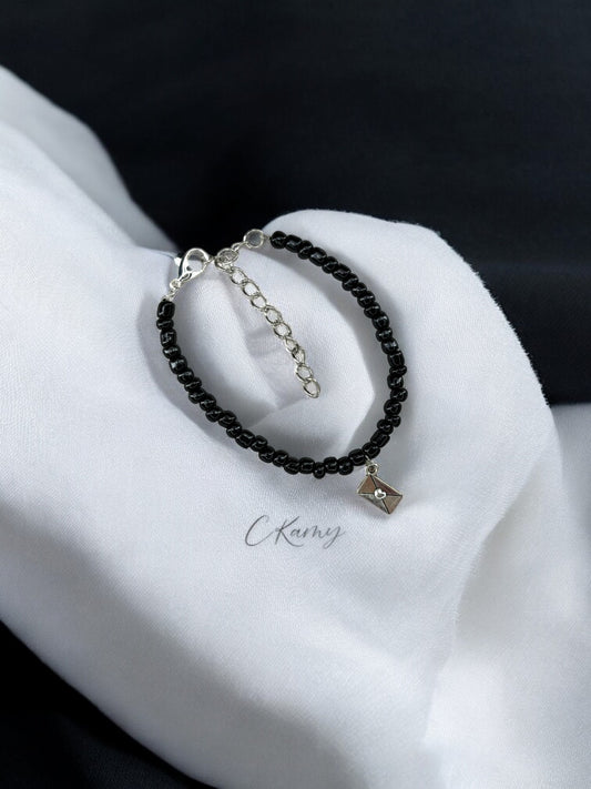 Bracelet femme courrier rocaille noir