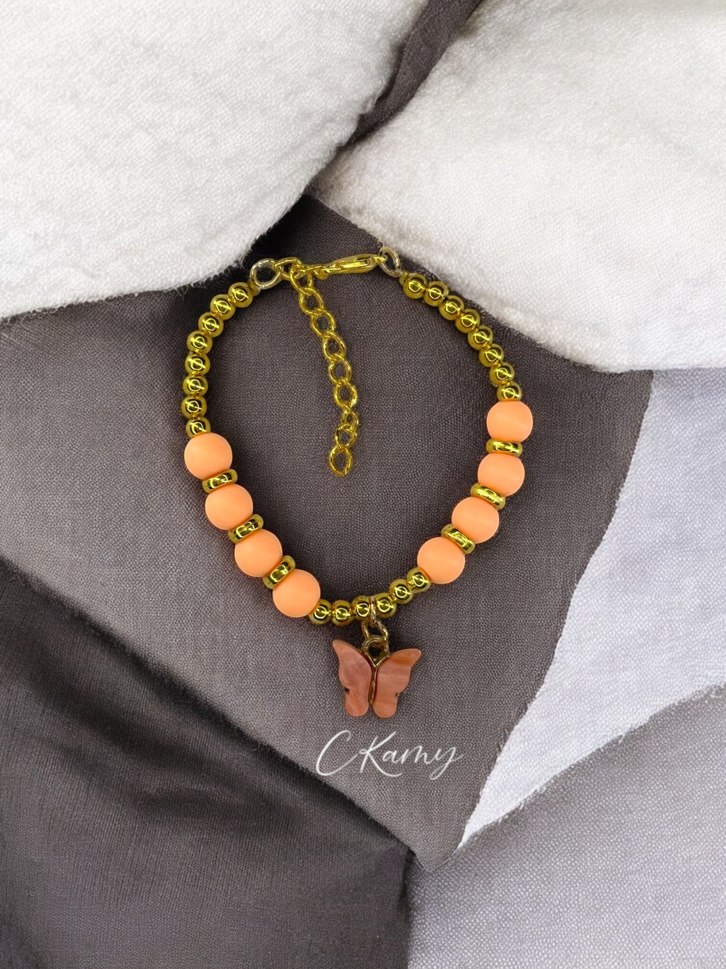 Bracelet femme papillon unicolore doré orange