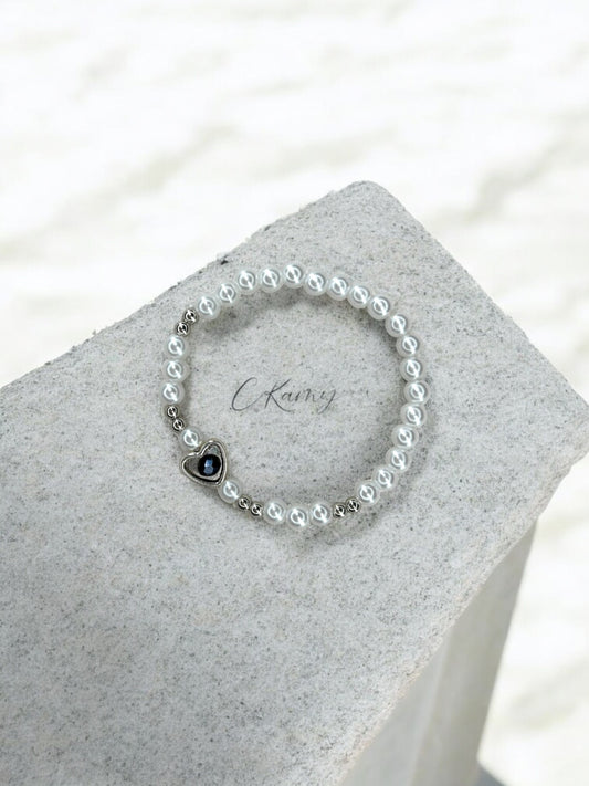 Bracelet femme perles nacrées coeur facette bleu marine