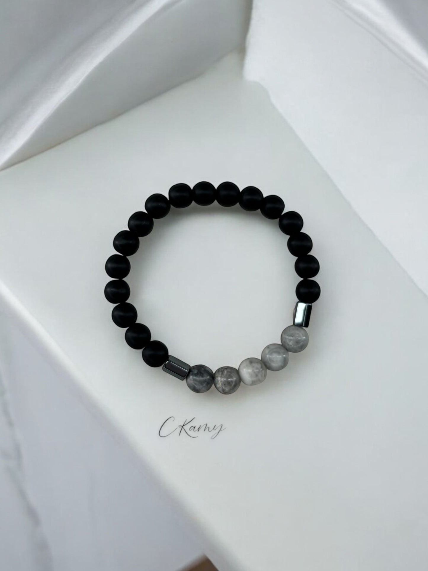 Bracelet homme milieu gris perles noir