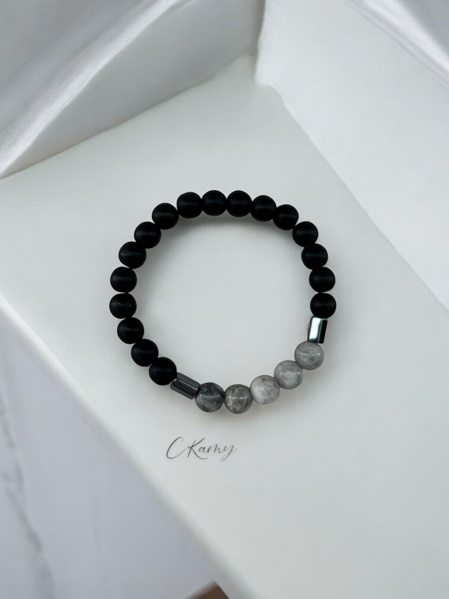 Bracelet homme milieu gris perles noir