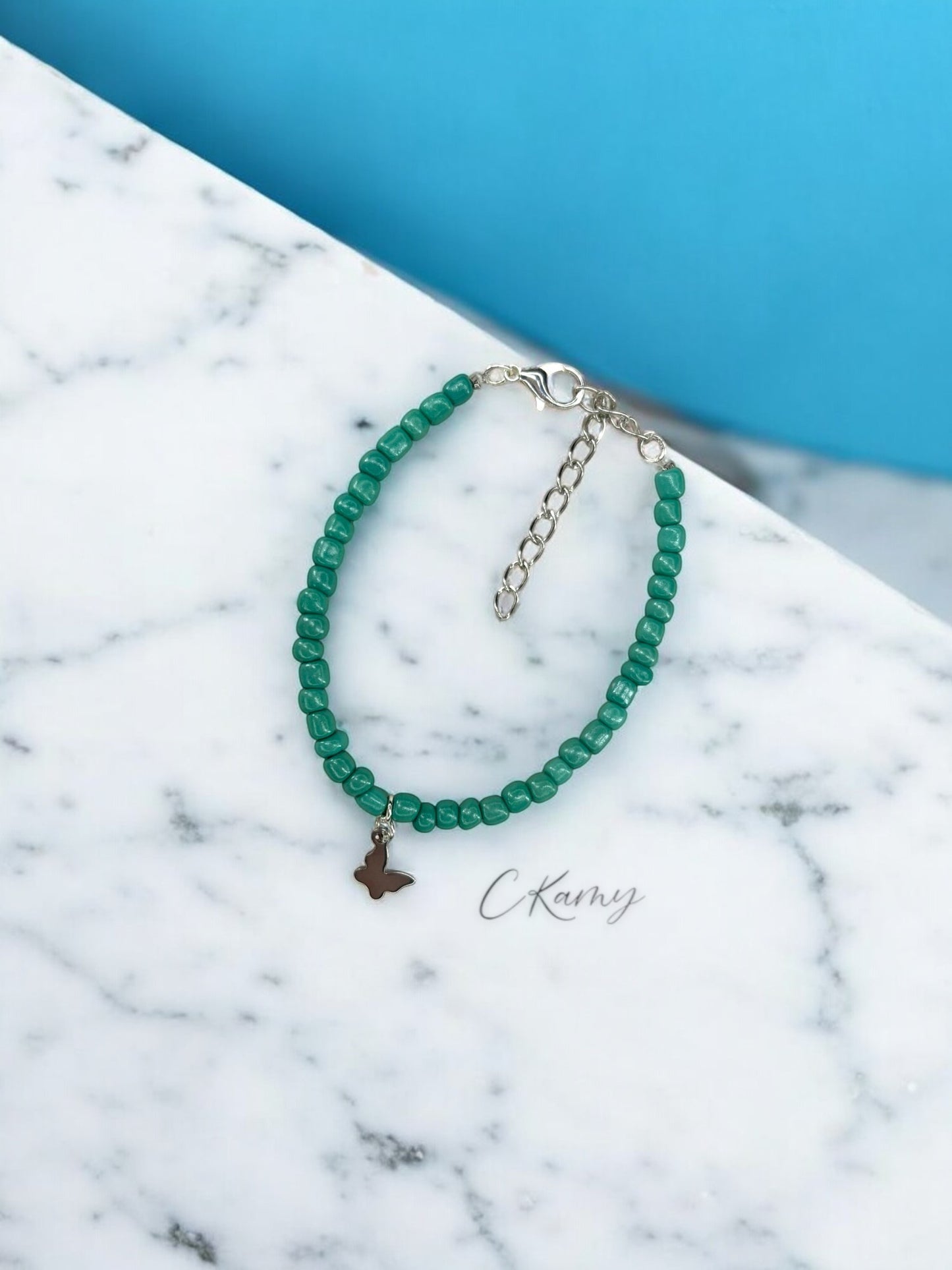 Bracelet papillon rocaille bleu vert
