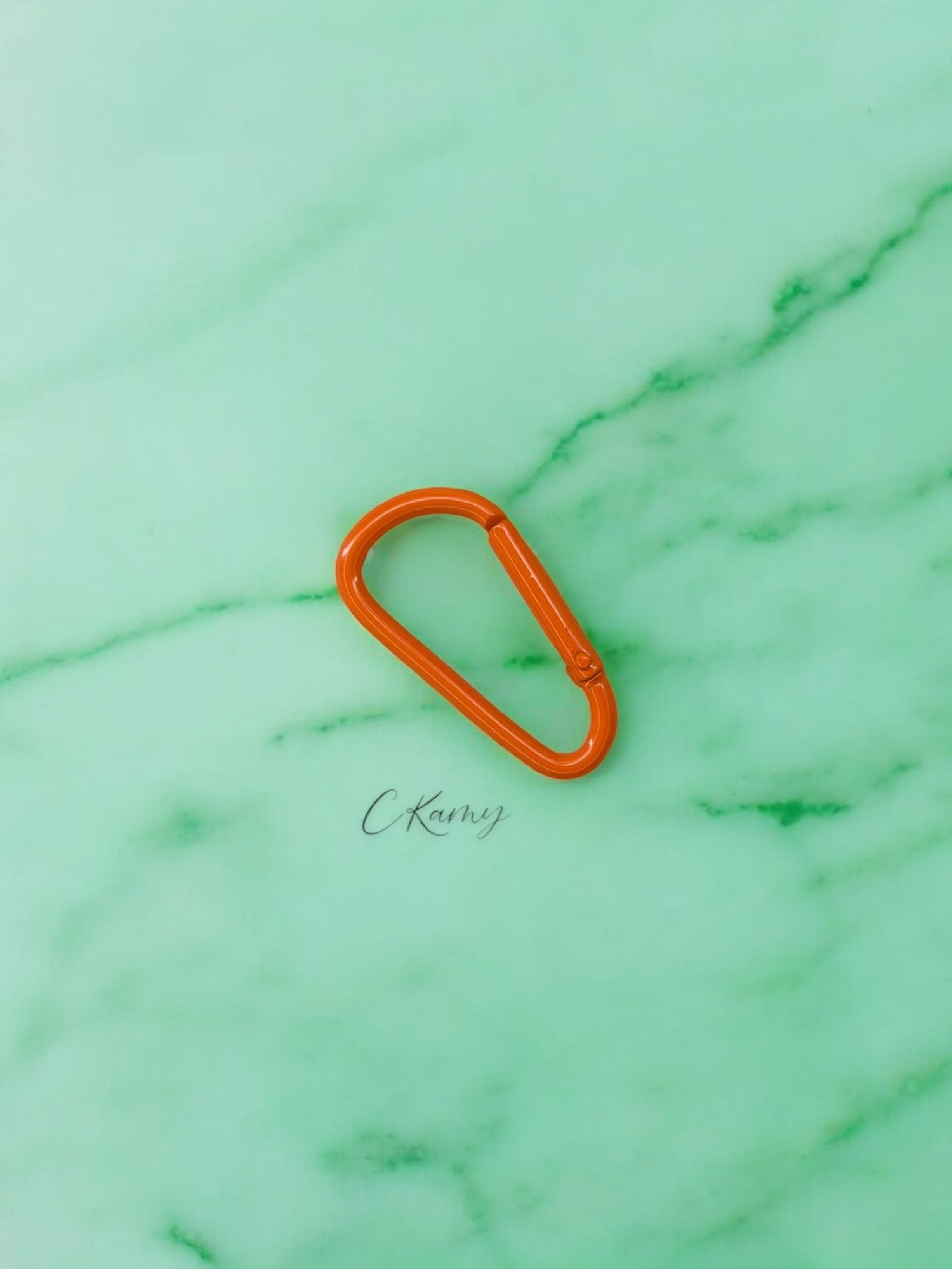 Mousqueton unicolore orange
