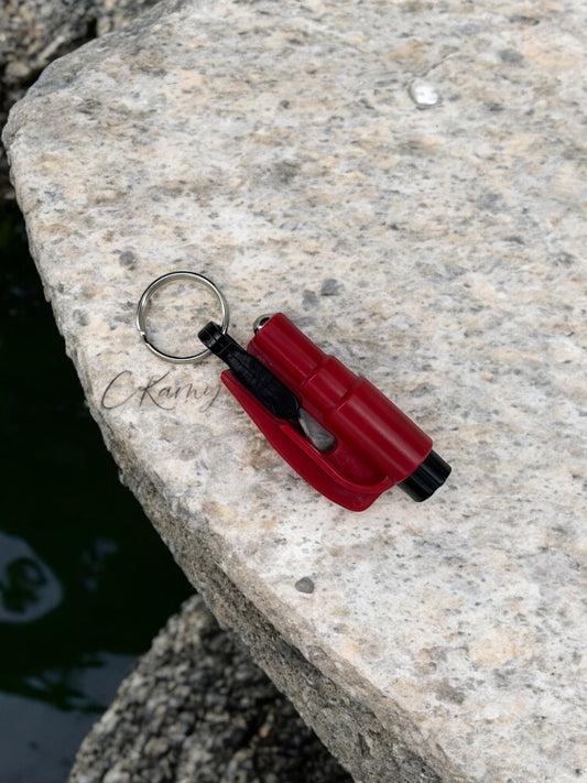 Porte clé brise vitre / coupe ceinture rouge