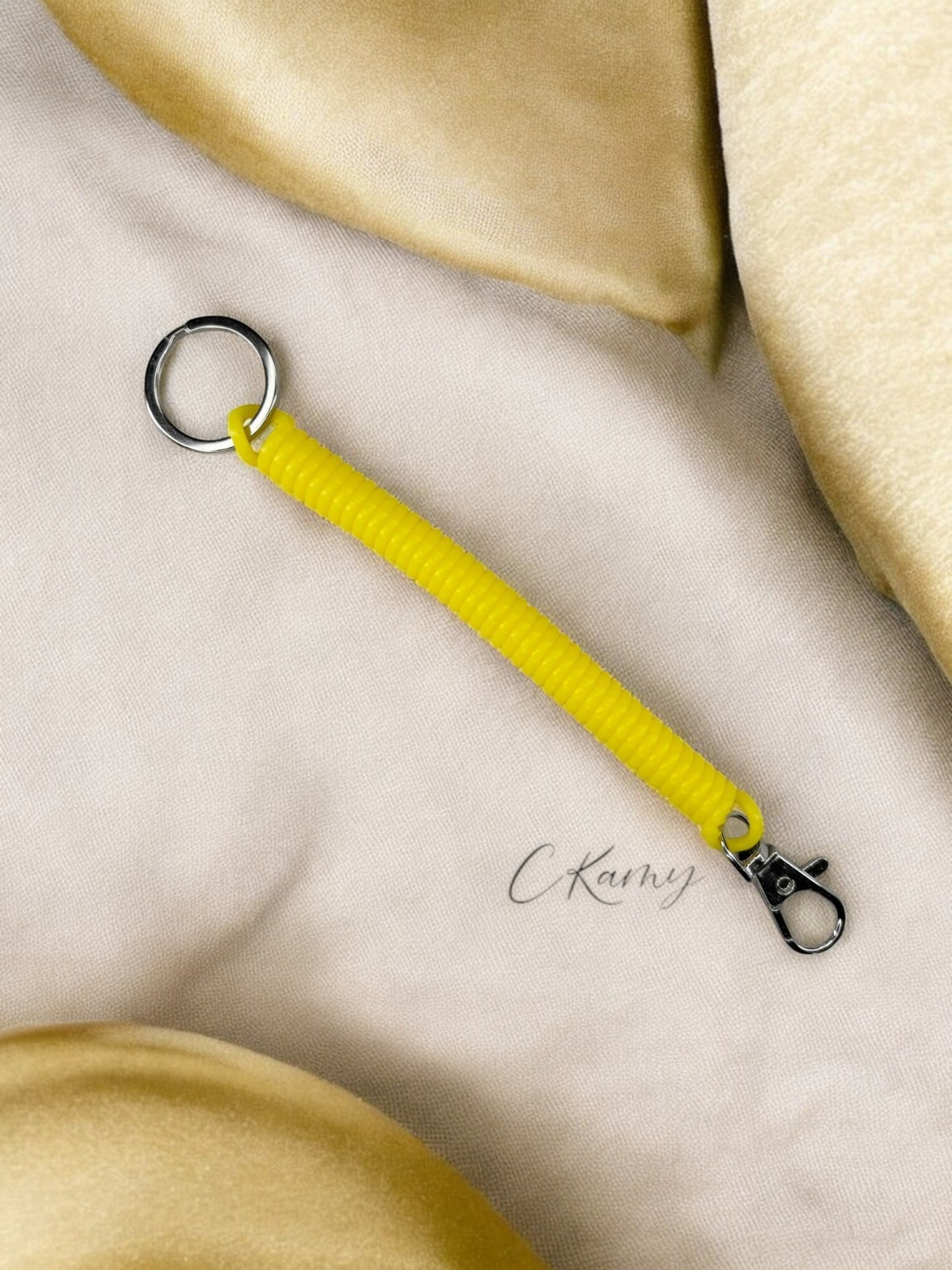 Porte clé câble spirale jaune