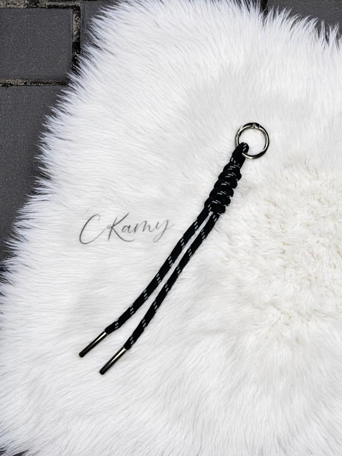 Porte clé lacet noué noir
