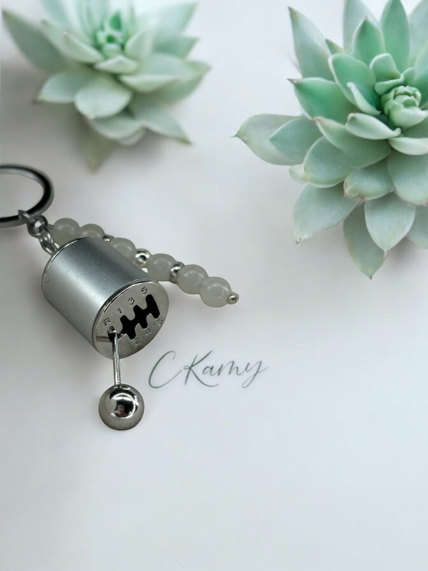 Porte clé personnalisé boîte de vitesse gris