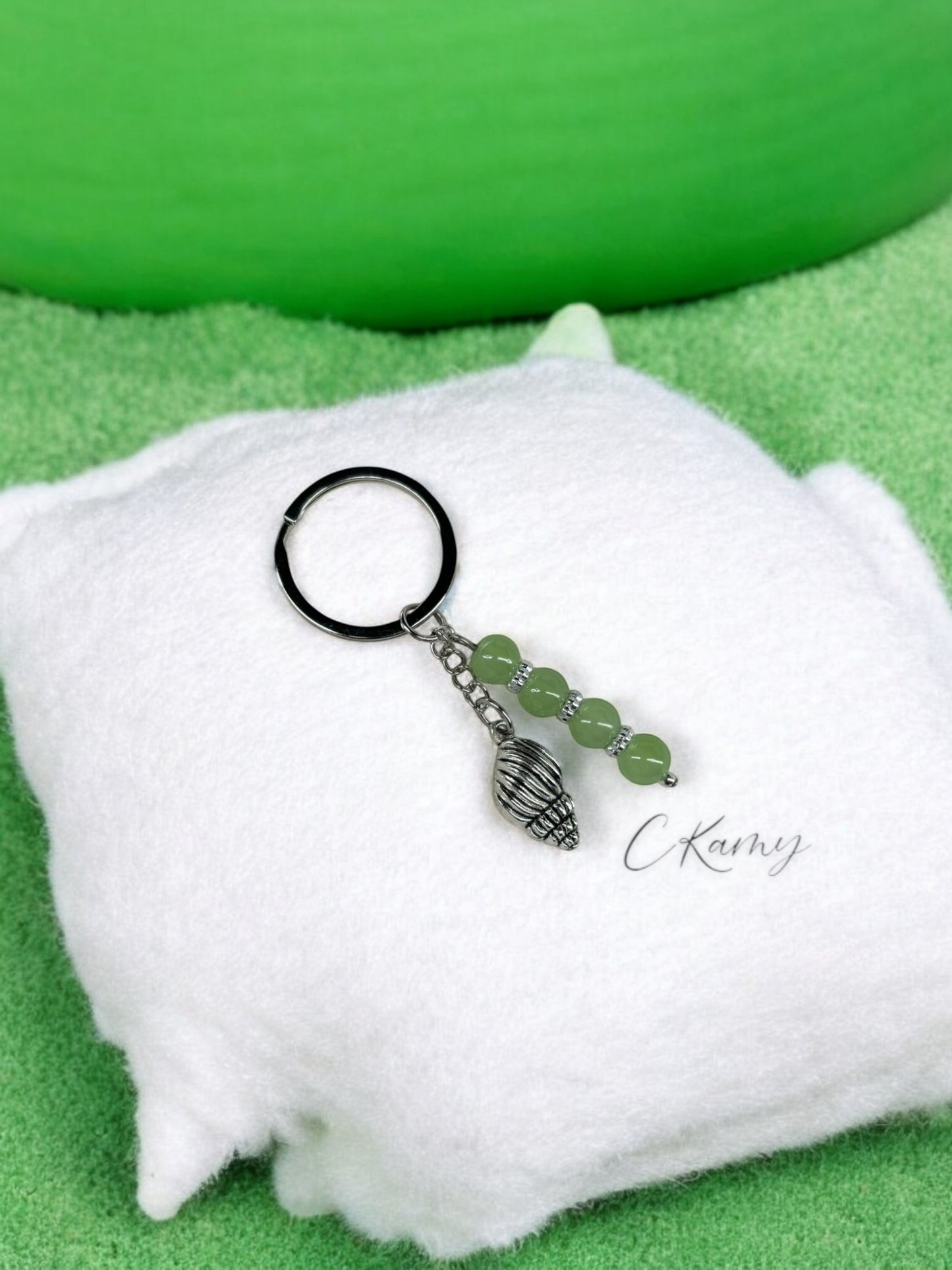 Porte clé personnalisé coquillage bulot vert