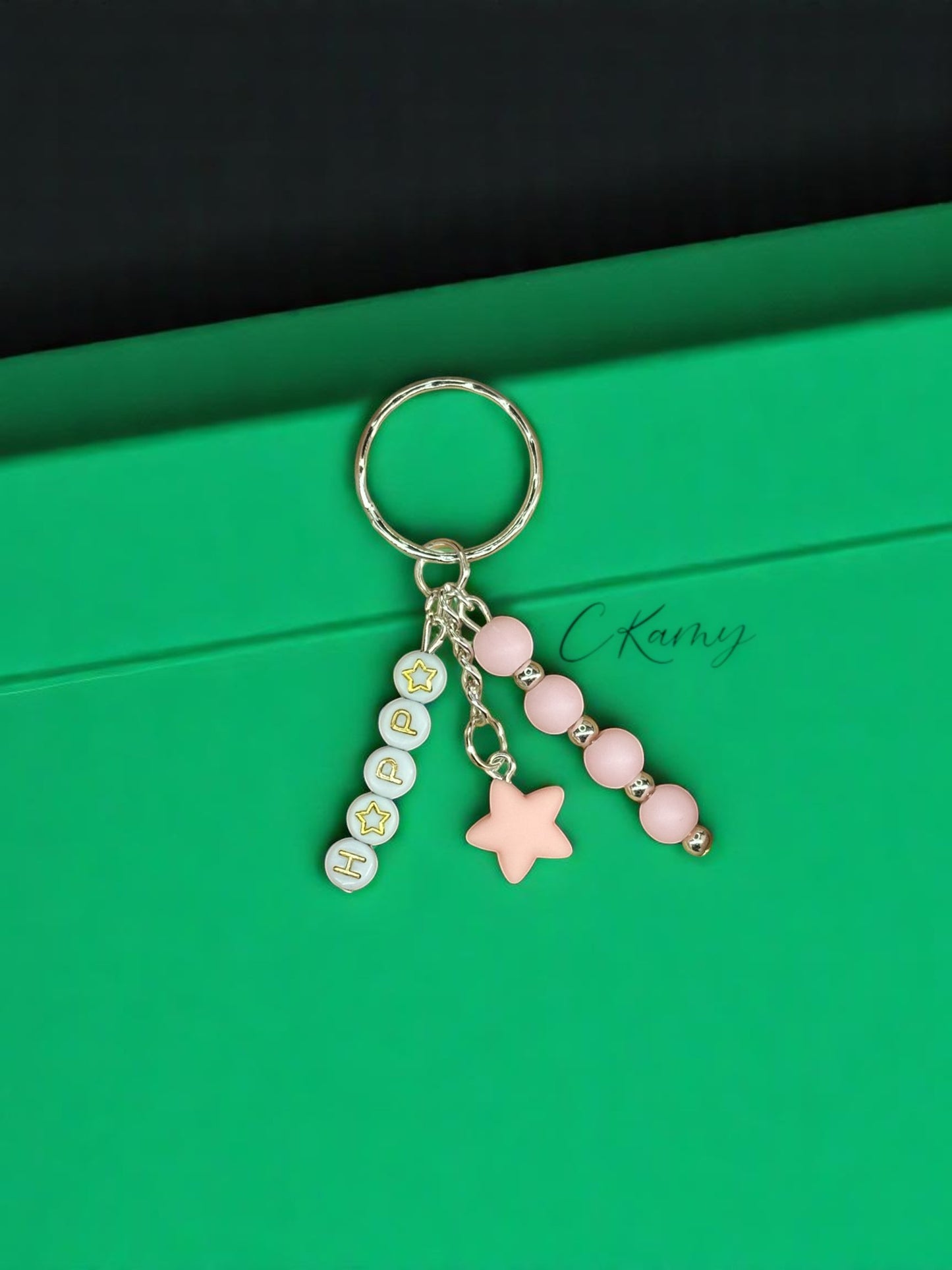 Porte clé personnalisé petite étoile rose clair rond