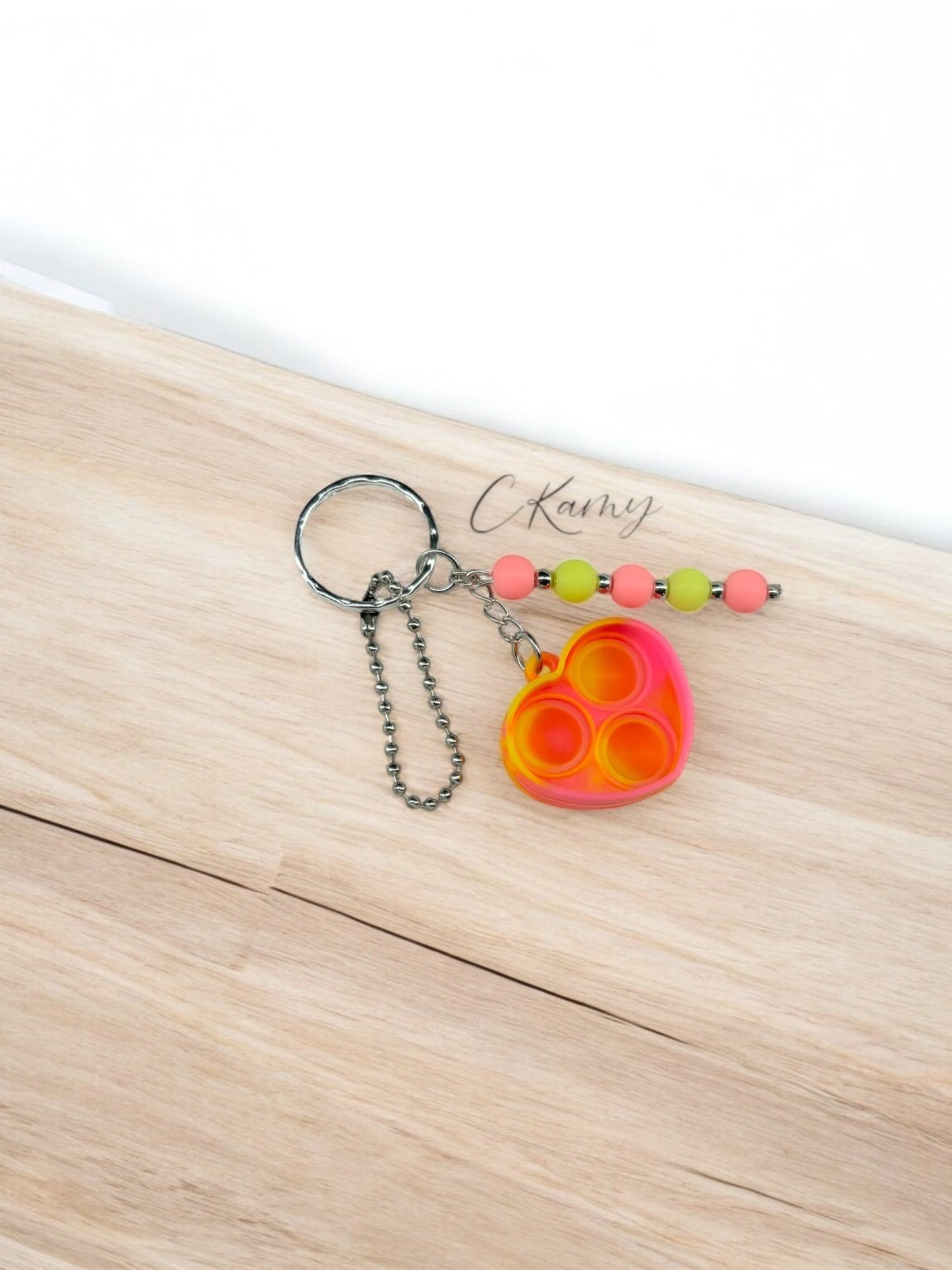 Porte clé personnalisé pop it coeur jaune rose