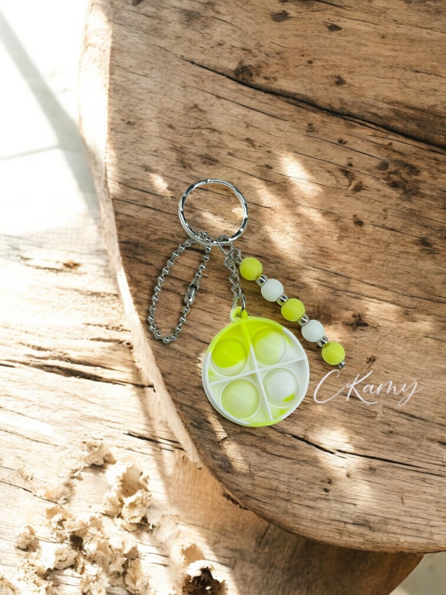 Porte clé personnalisé pop it rond blanc jaune
