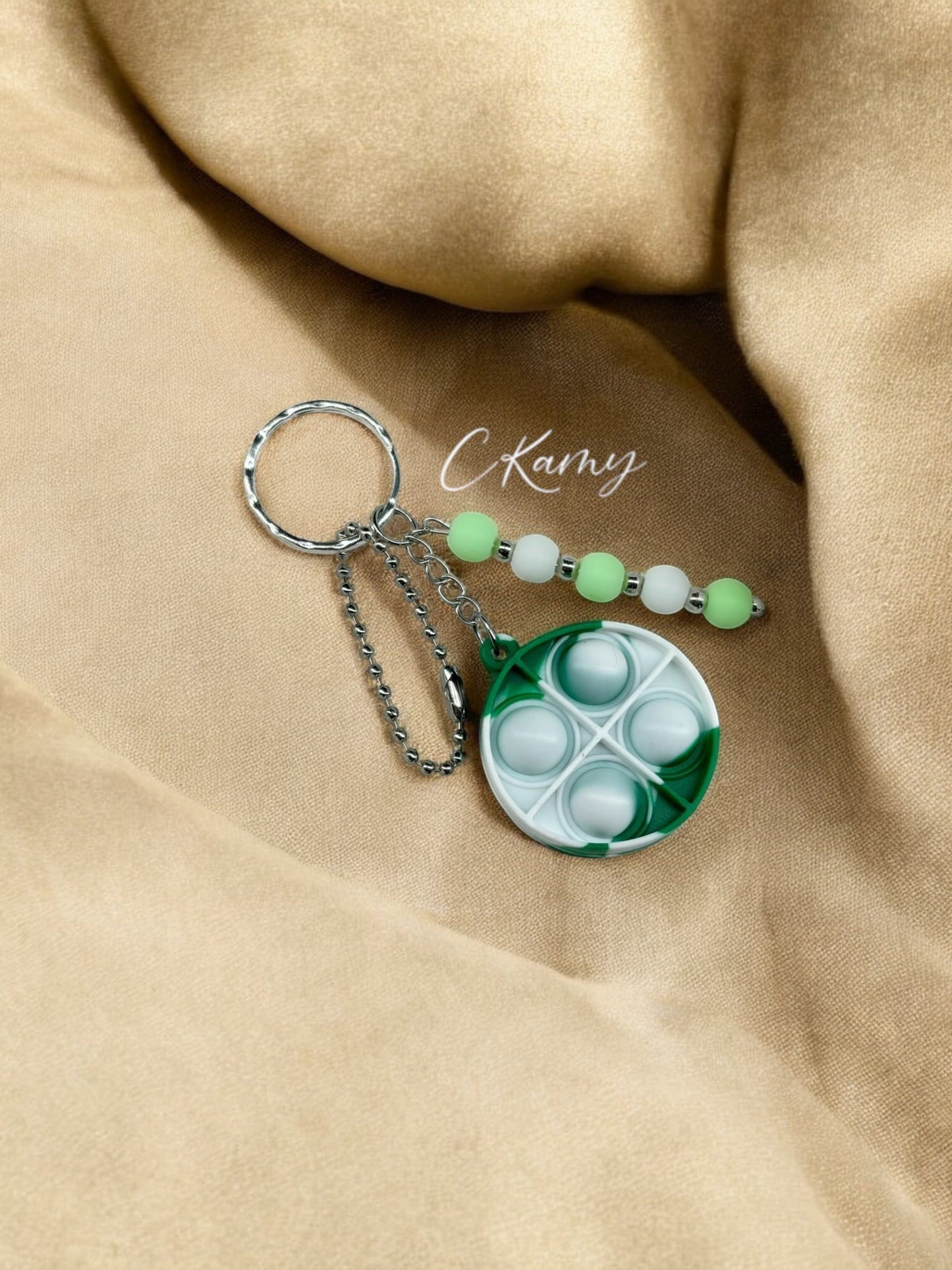 Porte clé personnalisé pop it rond vert clair blanc