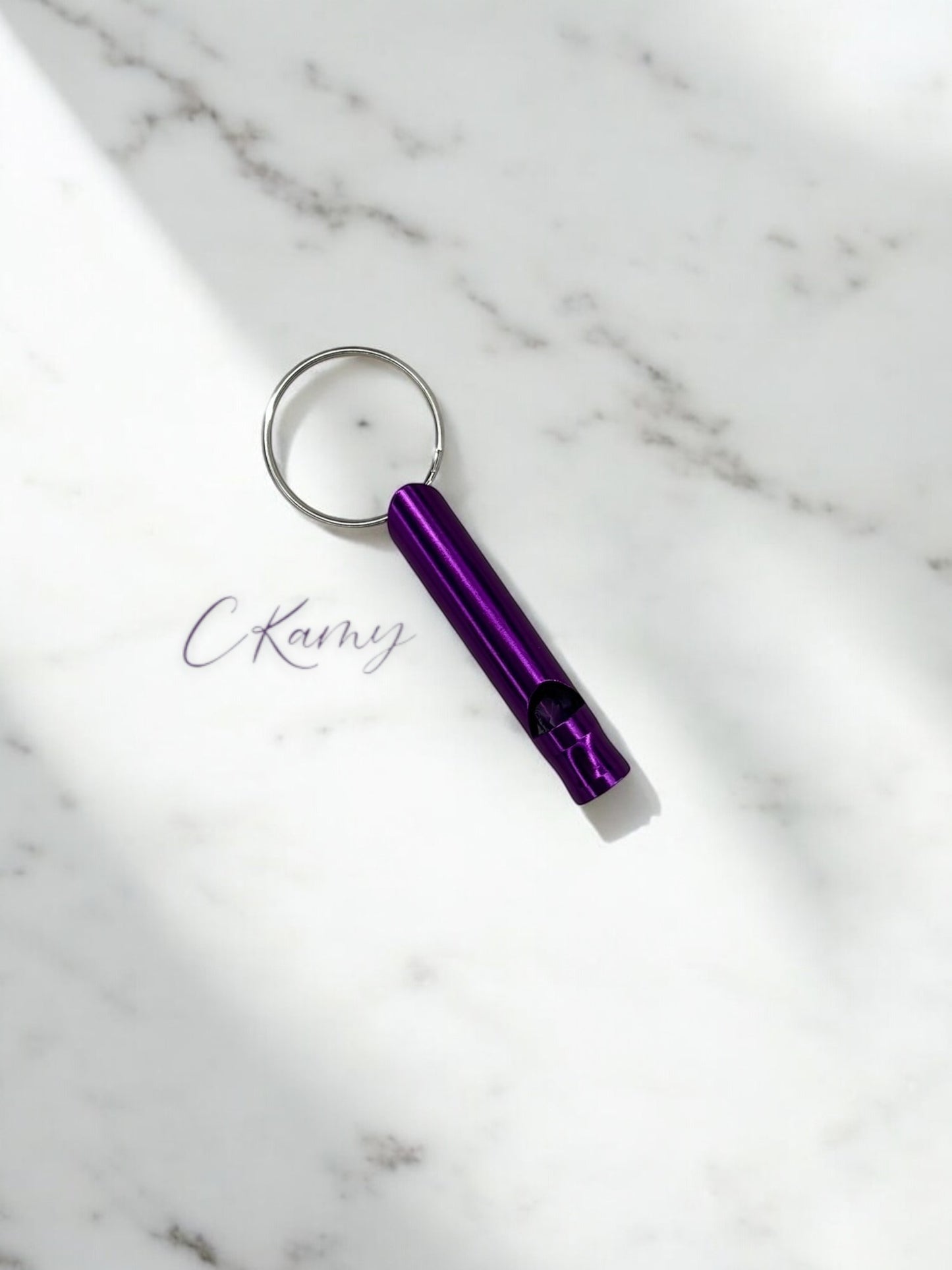 Porte clé sifflet violet