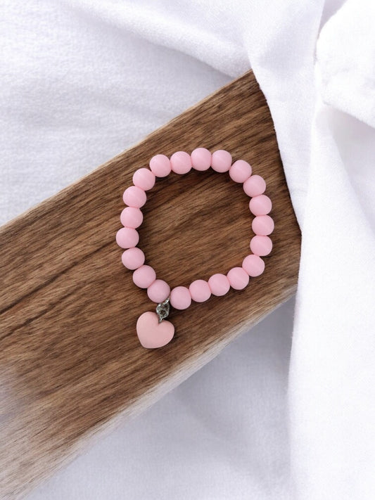 Bracelet enfant accroche coeur rose clair