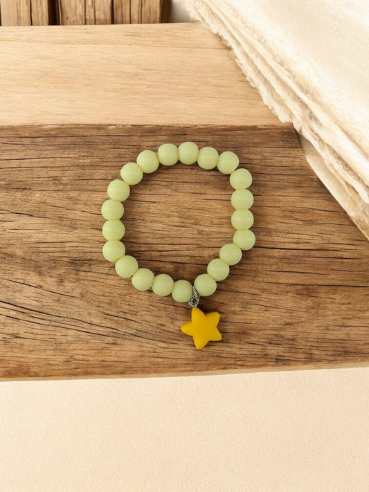 Bracelet enfant accroche étoile jaune clair