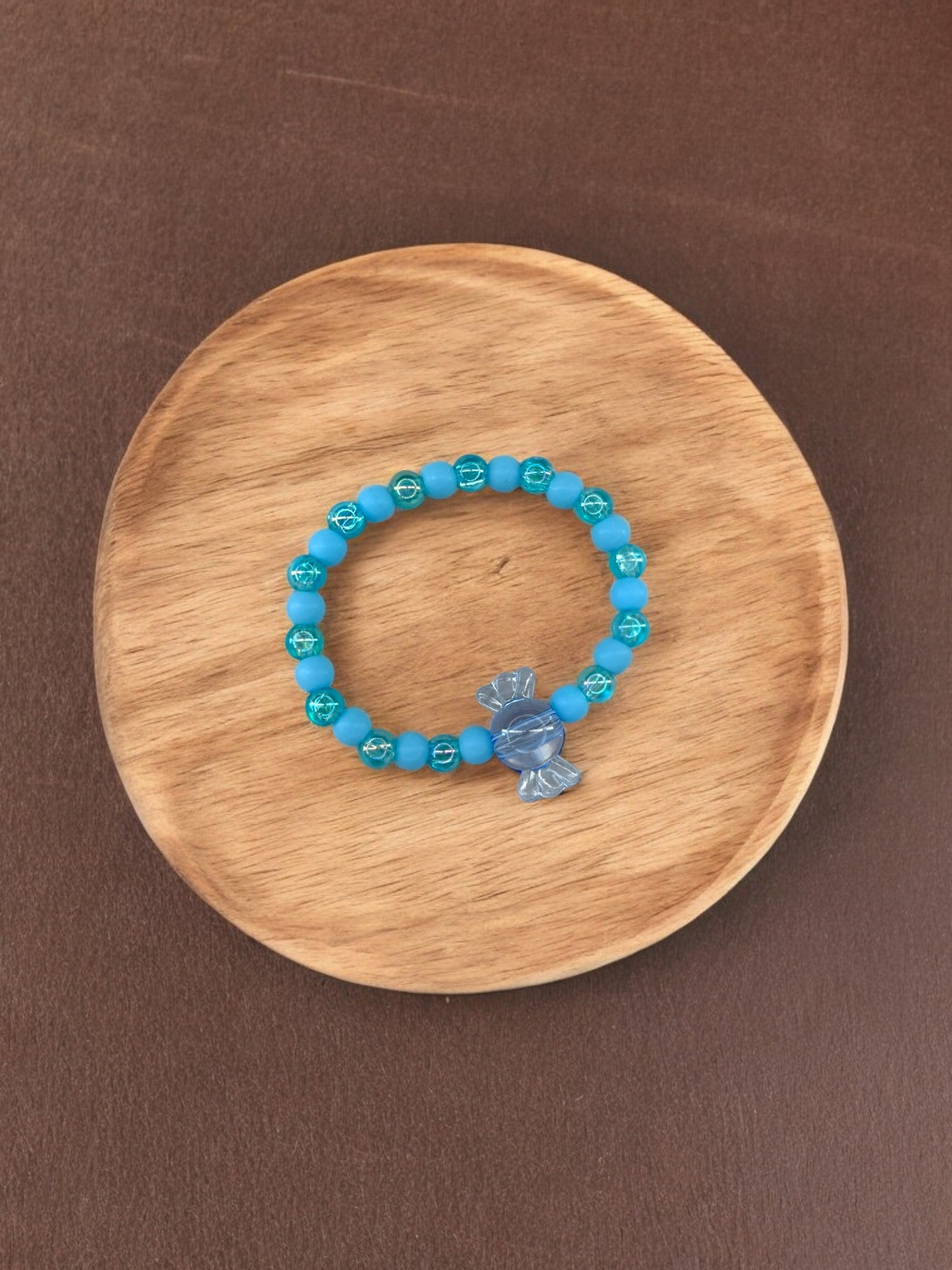 Bracelet enfant bonbon alterné bleu transparent