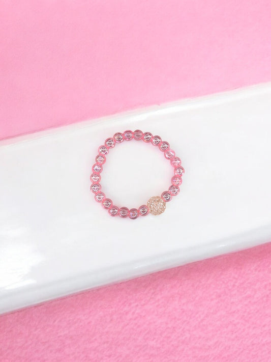 Bracelet enfant boule brillante rose