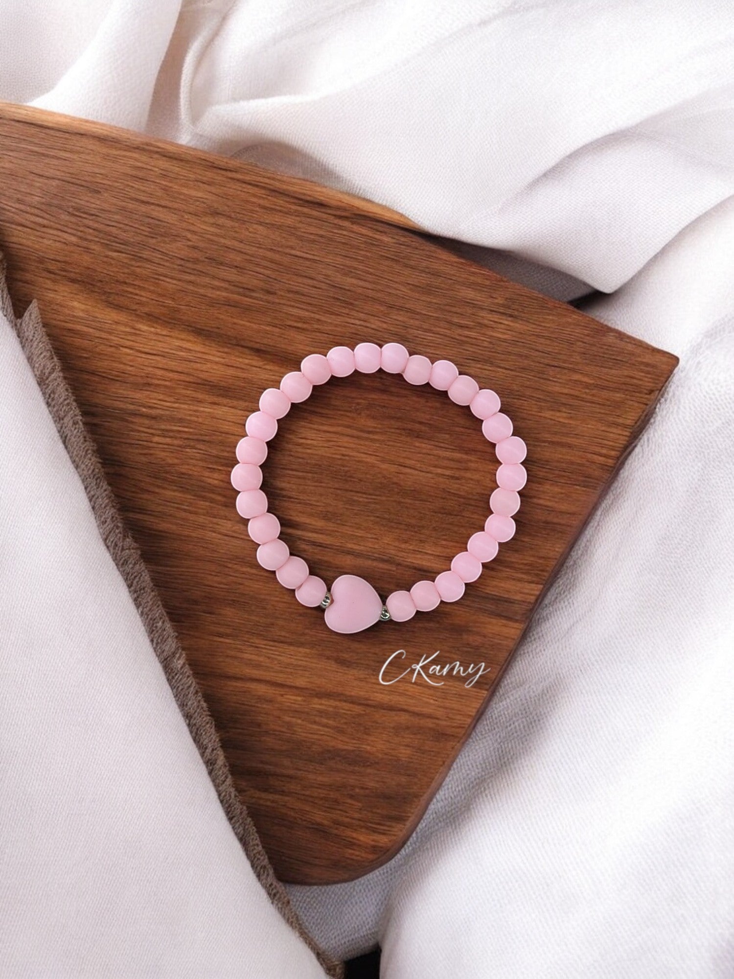Bracelet enfant coeur perles rose clair