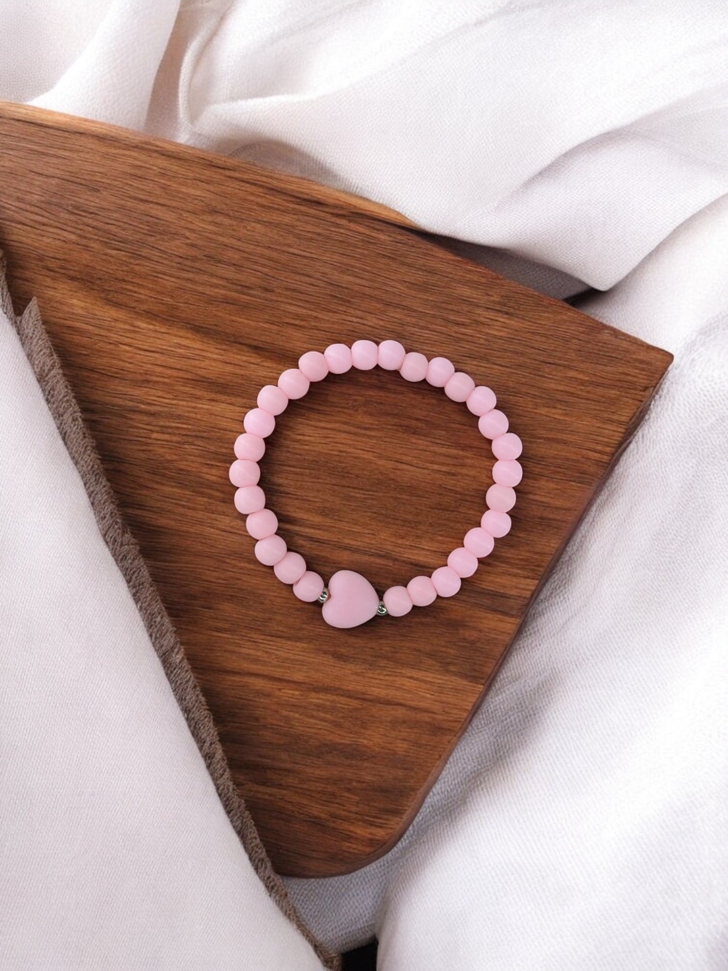 Bracelet enfant coeur perles rose clair