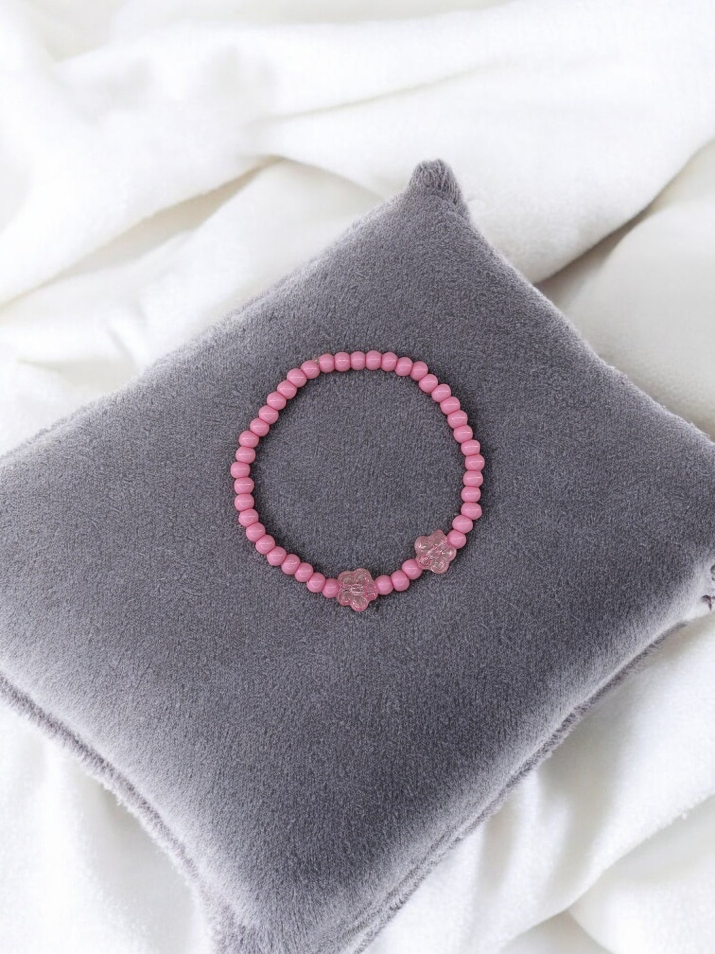 Bracelet enfant deux fleurs rose clair