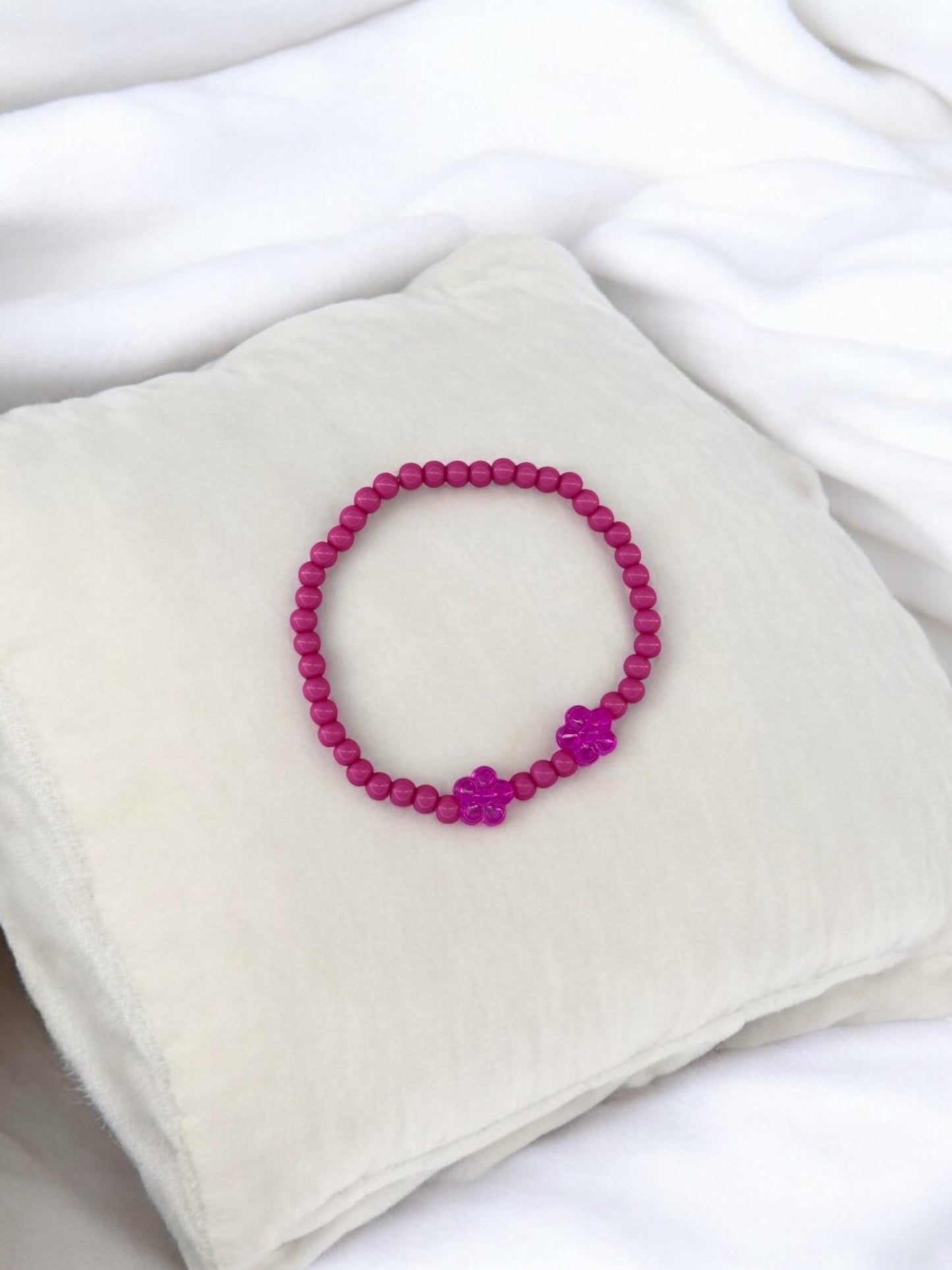 Bracelet enfant deux fleurs rose foncé